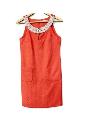 Sandra Darren coral dress with pearl neckline